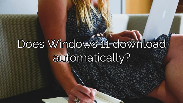 Does Windows 11 download automatically?