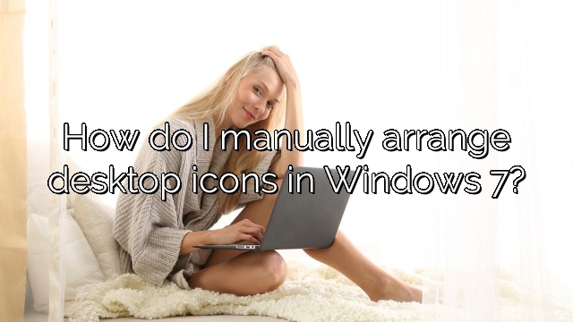 How do I manually arrange desktop icons in Windows 7?
